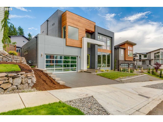 14 Northwest Hood Street Camas, WA 98607 - Photo 2 of 36 a front view of a house with a yard