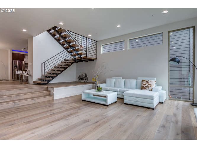 14 Northwest Hood Street Camas, WA 98607 - Photo 6 of 36 a living room with furniture and stairs