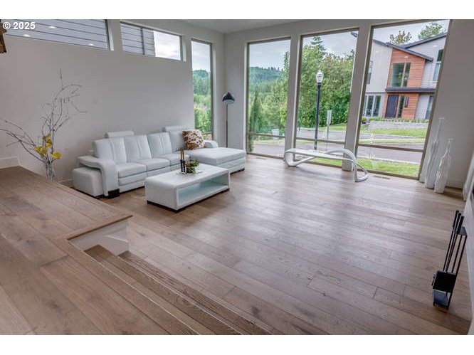 14 Northwest Hood Street Camas, WA 98607 - Photo 8 of 36 a living room with furniture and a floor to ceiling window