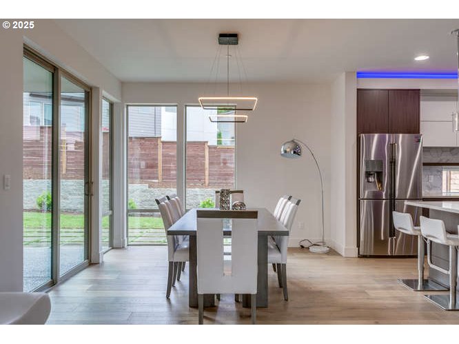 14 Northwest Hood Street Camas, WA 98607 - Photo 10 of 36 a living room with furniture a window and kitchen view