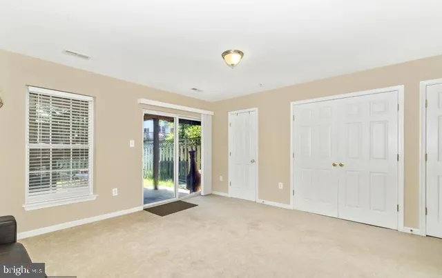 a view of a workspace with furniture