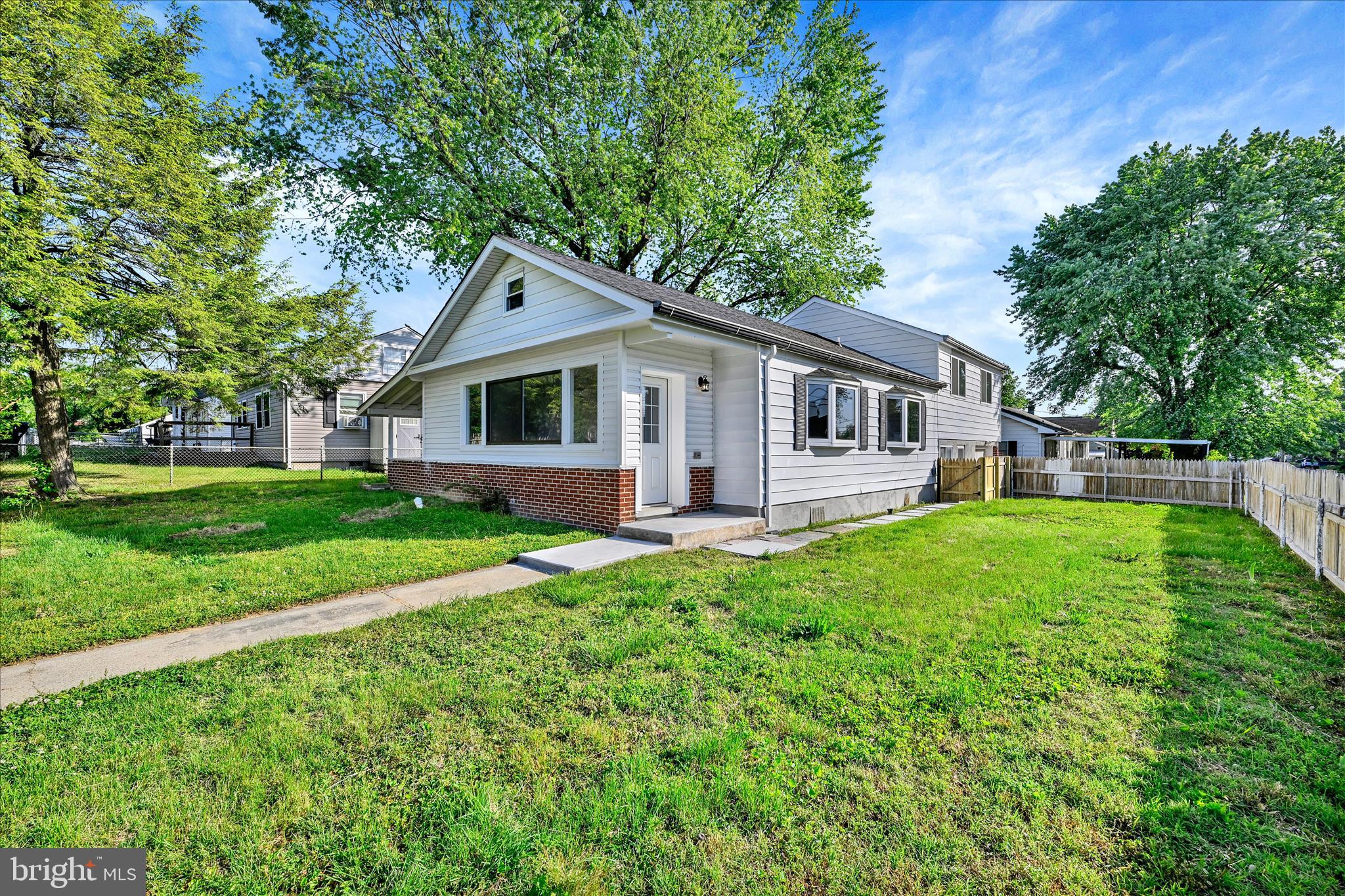 2 Armor Court Baltimore, MD 21220 - Photo 2 of 33 a front view of house with yard and green space