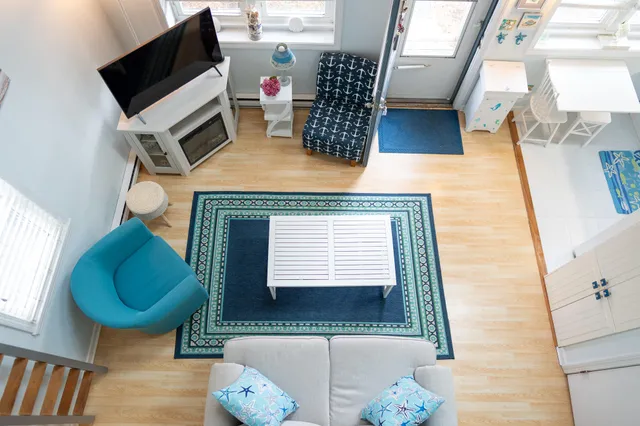 a room with furniture and a fireplace