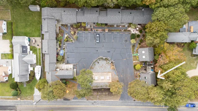 an aerial view of residential house with outdoor space
