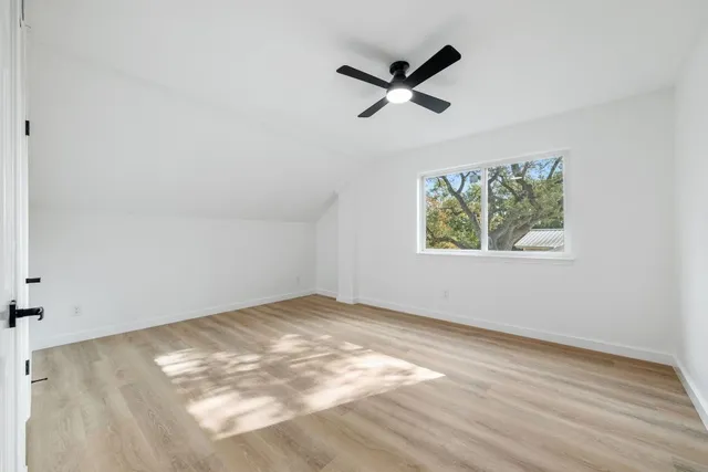 a bathroom with a sink a mirror and a toilet