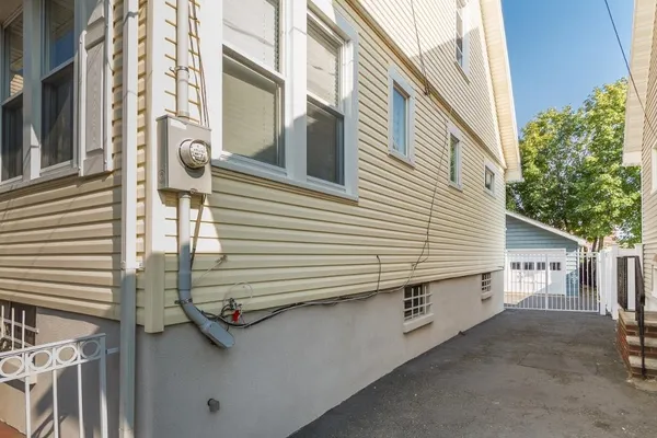 a view of a house with a street