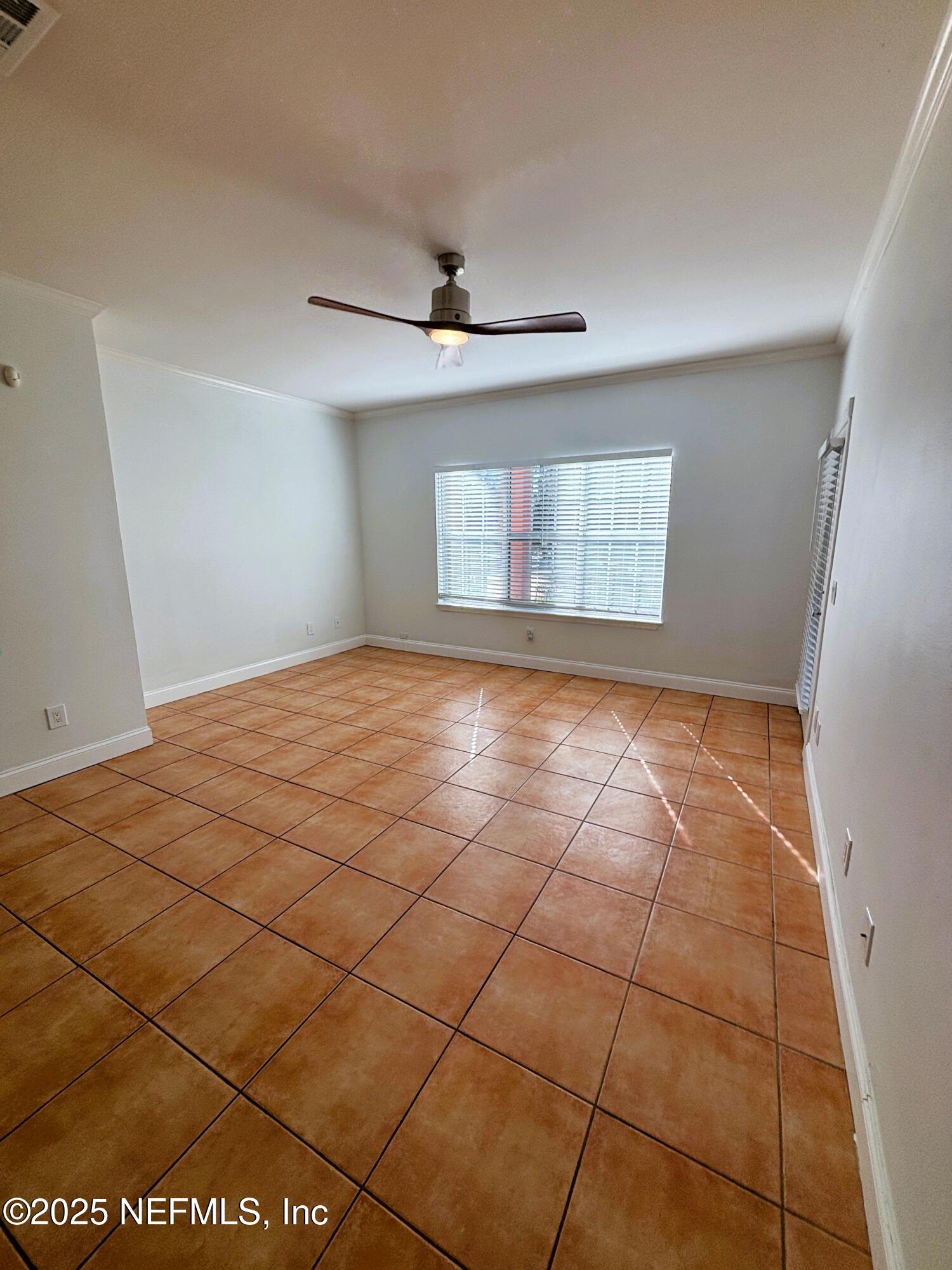 201 Colima Court, Unit 1211 Ponte Vedra Beach, FL 32082 - Photo 12 of 35 a view of an empty room and window