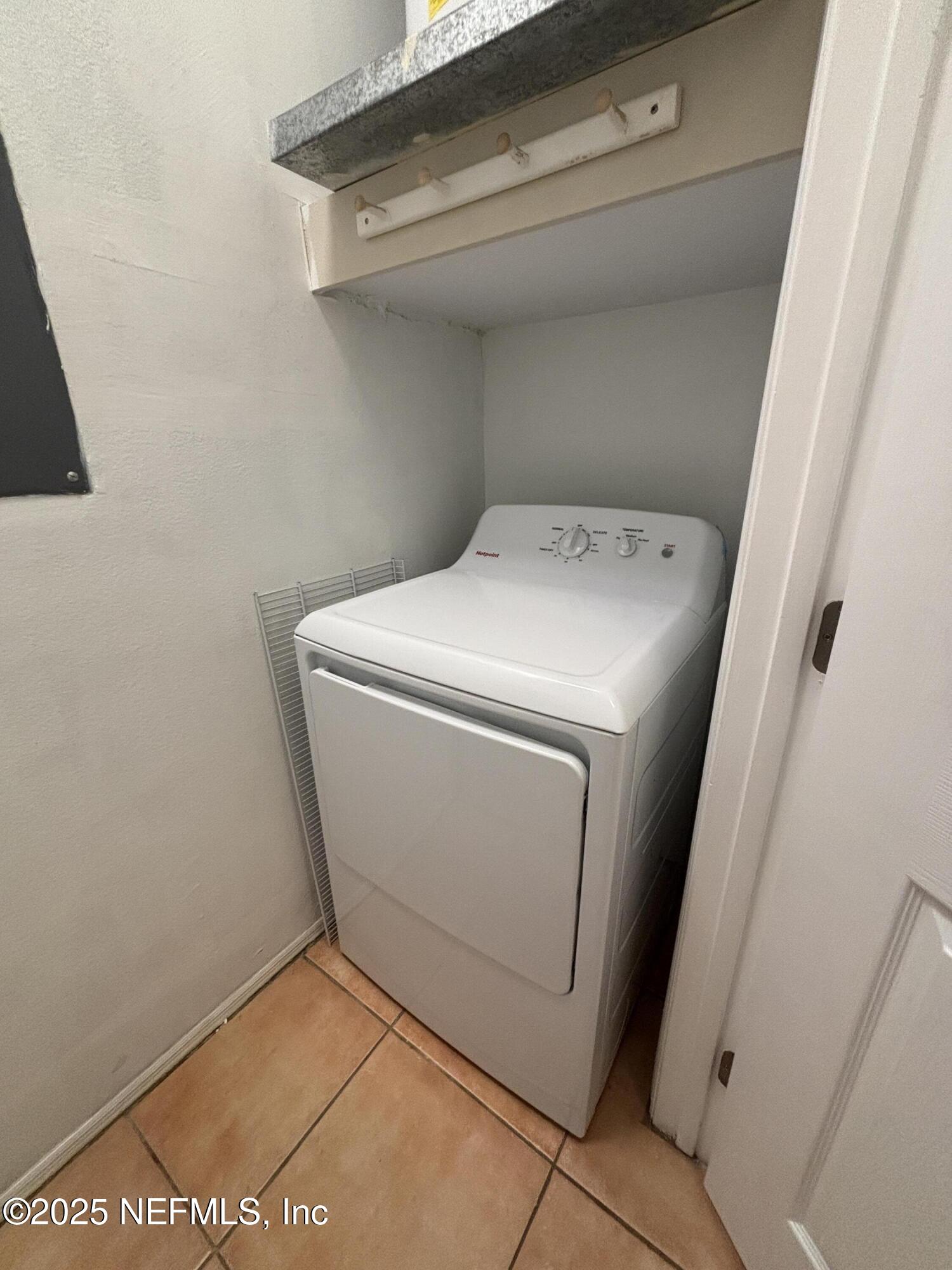 201 Colima Court, Unit 1211 Ponte Vedra Beach, FL 32082 - Photo 15 of 35 a utility room with dryer and washer