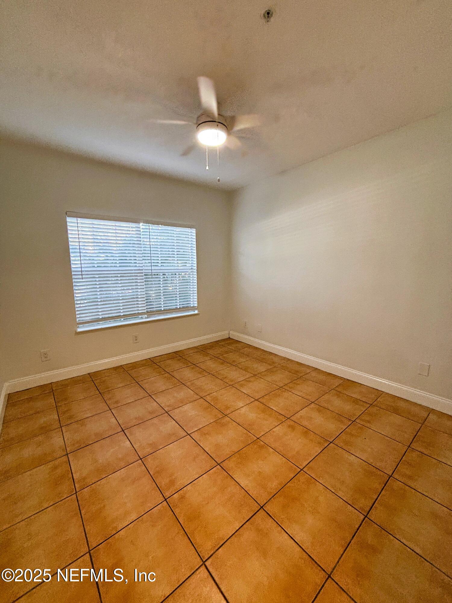 201 Colima Court, Unit 1211 Ponte Vedra Beach, FL 32082 - Photo 22 of 35 a view of an empty room and window