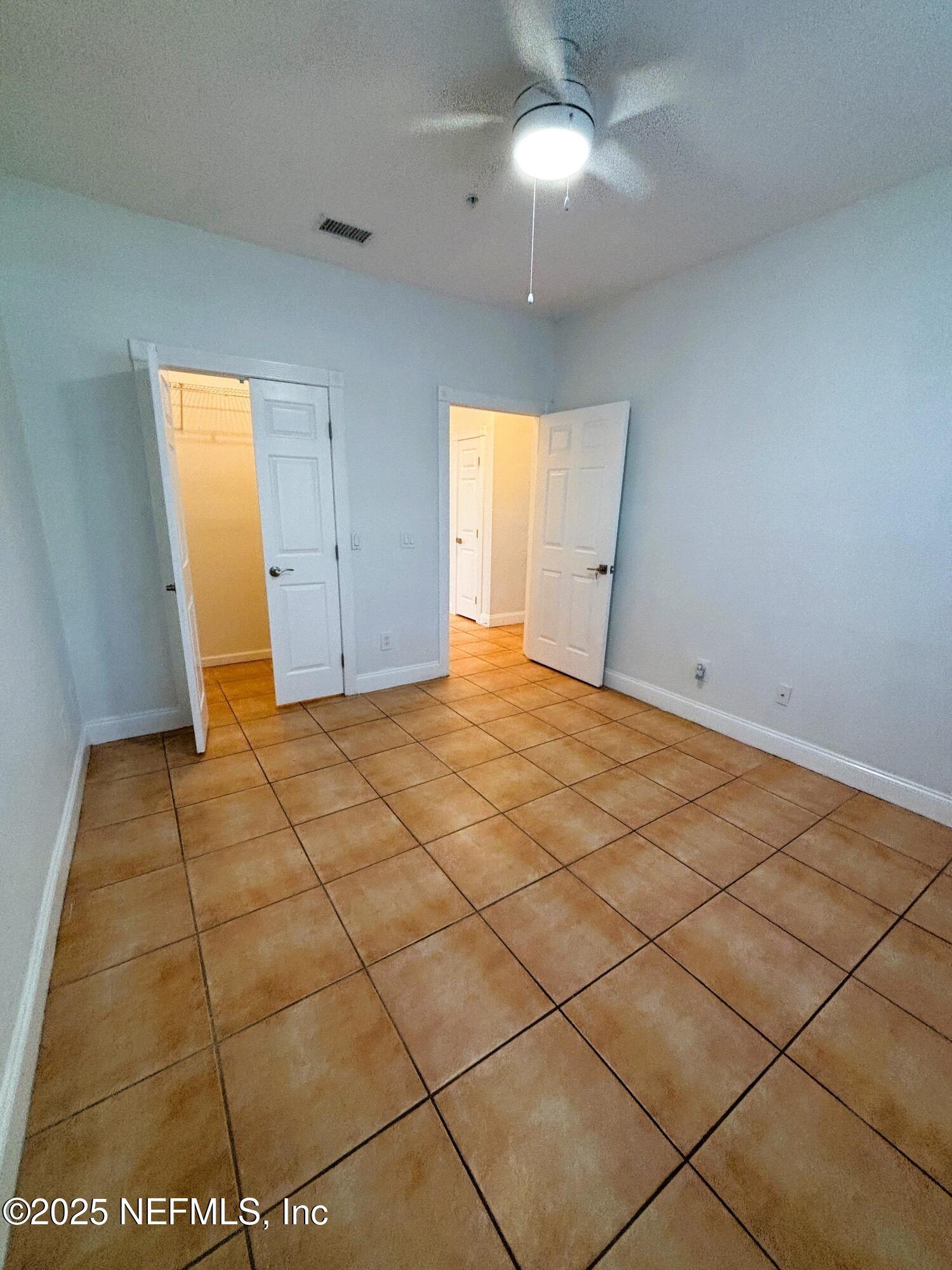 201 Colima Court, Unit 1211 Ponte Vedra Beach, FL 32082 - Photo 26 of 35 a view of an empty room and window