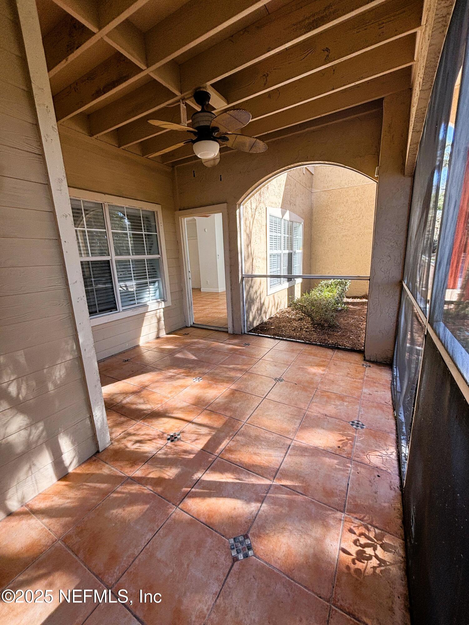 201 Colima Court, Unit 1211 Ponte Vedra Beach, FL 32082 - Photo 35 of 35 a view of a livingroom with a patio