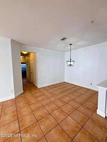 a bedroom with a bed and a shower