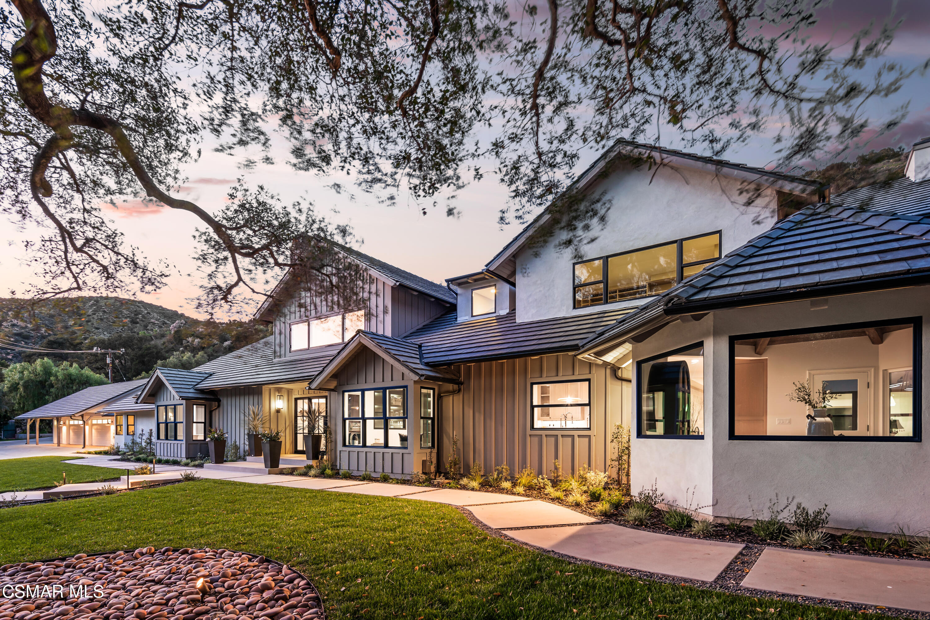1515 Hidden Valley Road Thousand Oaks, CA 91361 - Photo 19 of 56 a front view of a house with a yard