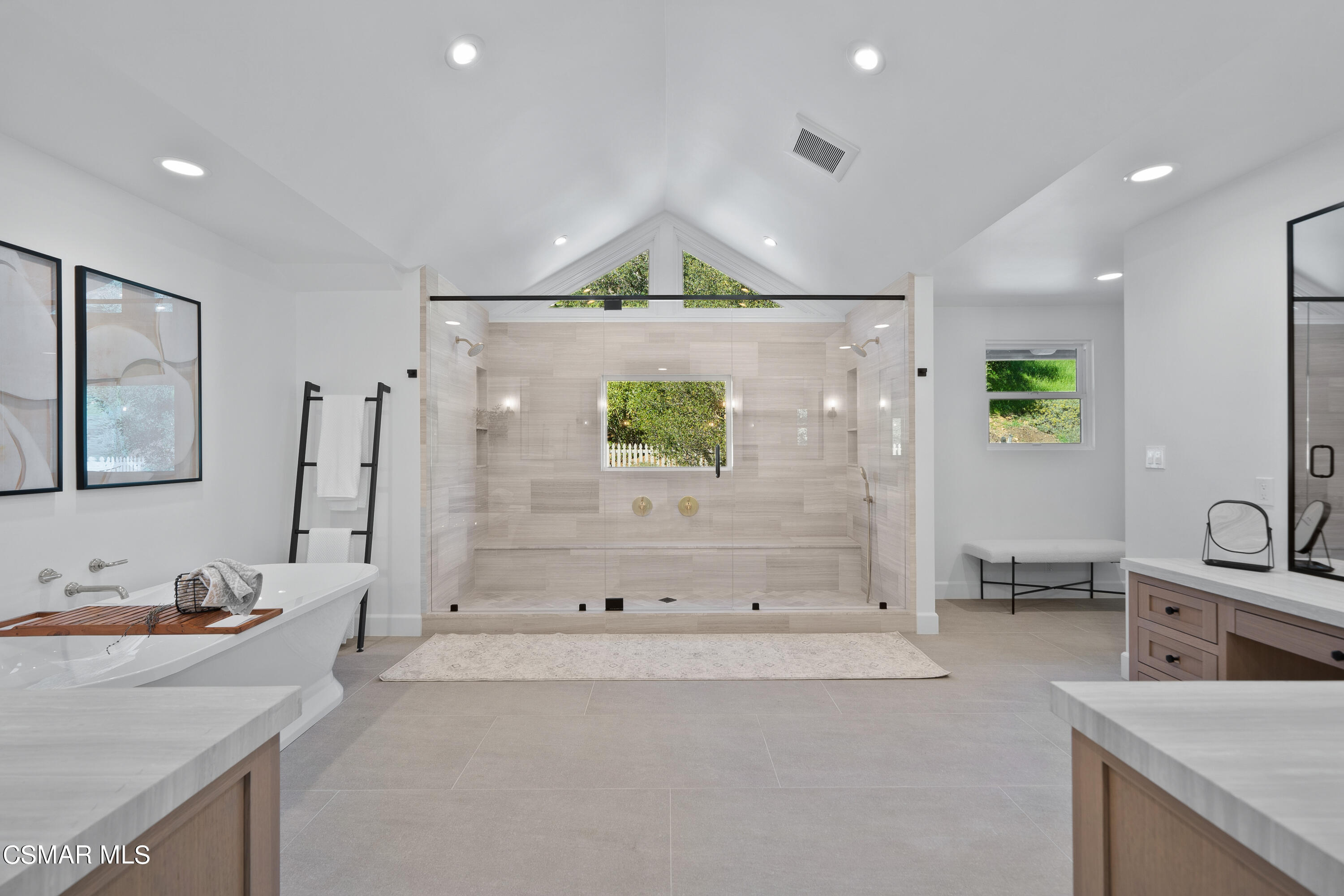 1515 Hidden Valley Road Thousand Oaks, CA 91361 - Photo 36 of 56 a bathroom with a tub sink and mirror