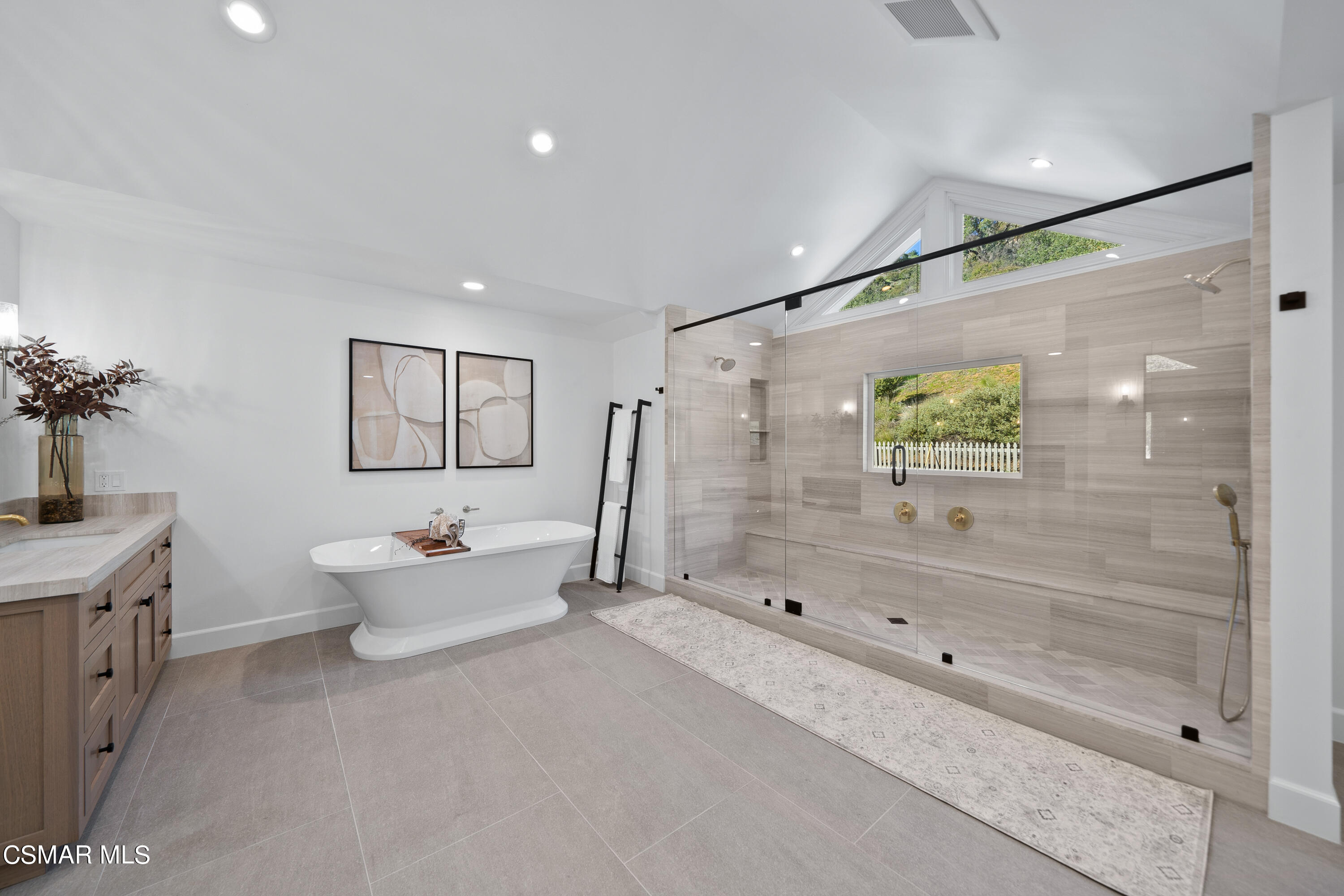 1515 Hidden Valley Road Thousand Oaks, CA 91361 - Photo 37 of 56 a bathroom with a double vanity sink toilet and shower