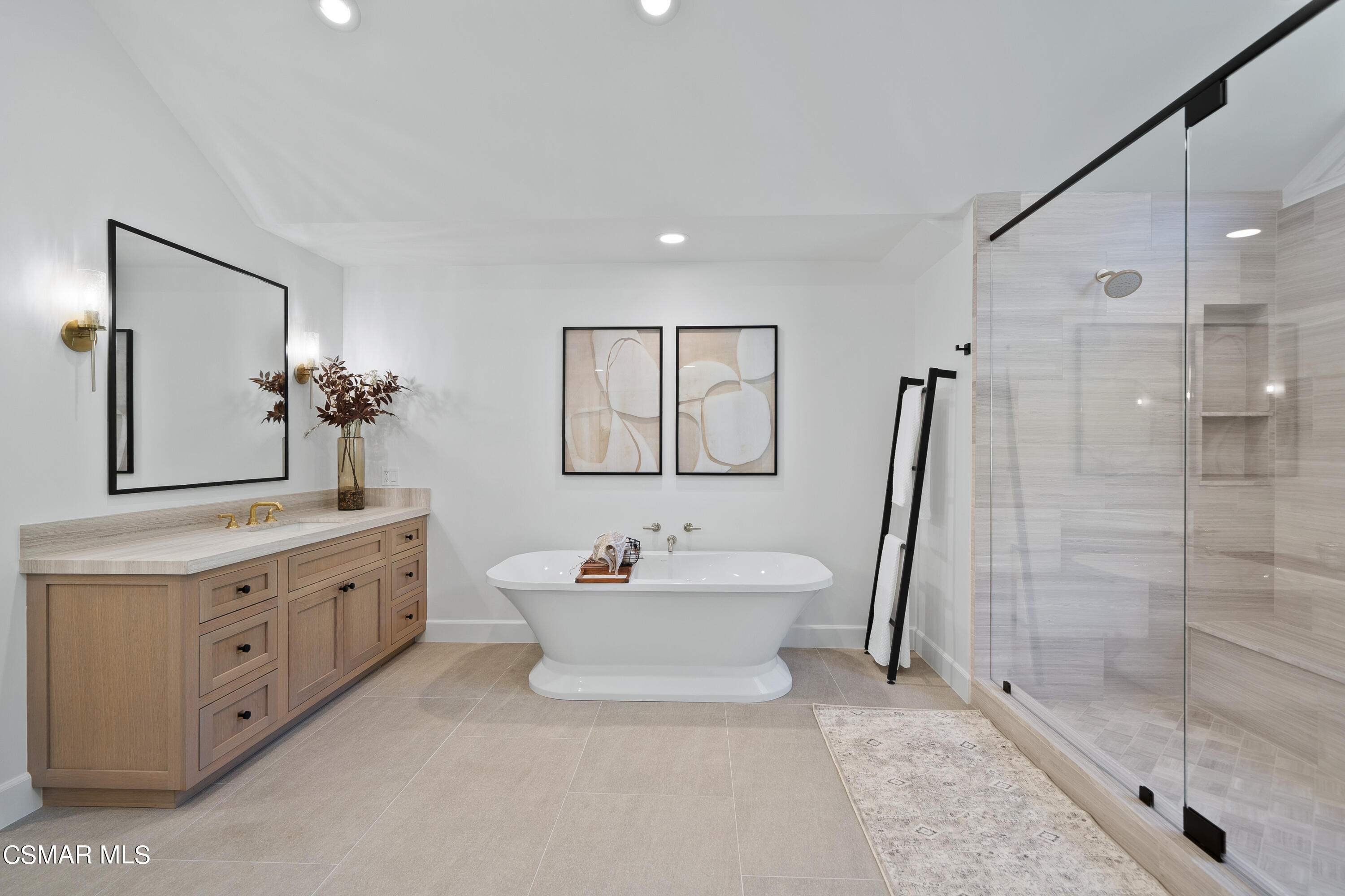 1515 Hidden Valley Road Thousand Oaks, CA 91361 - Photo 38 of 56 a bathroom with a sink mirror and a bathtub