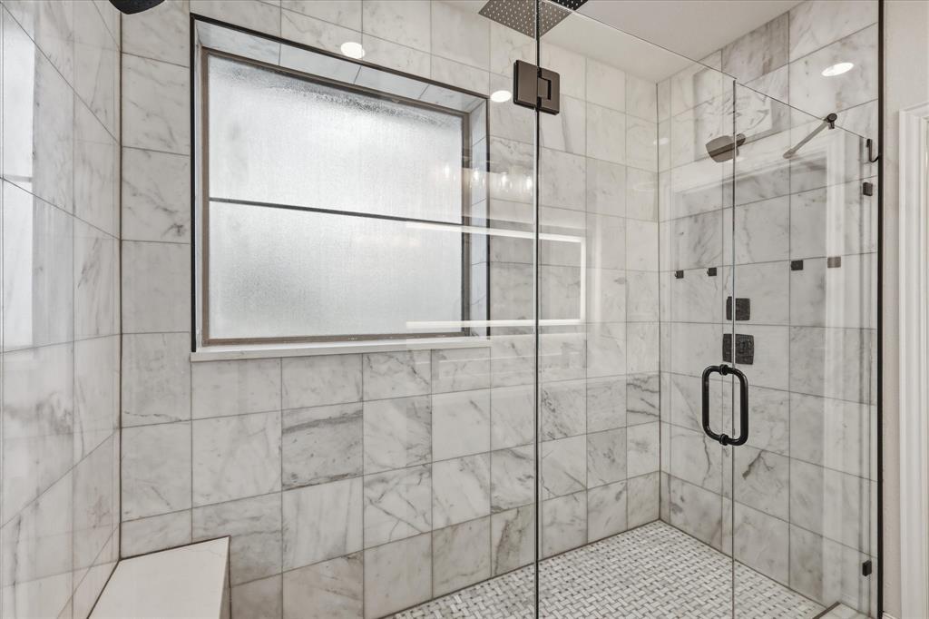 430 Ridgecrest Place Sanger, TX 76266 - Photo 20 of 40 Spacious walk-in shower featuring a frameless glass enclosure and full-height marble-look tile