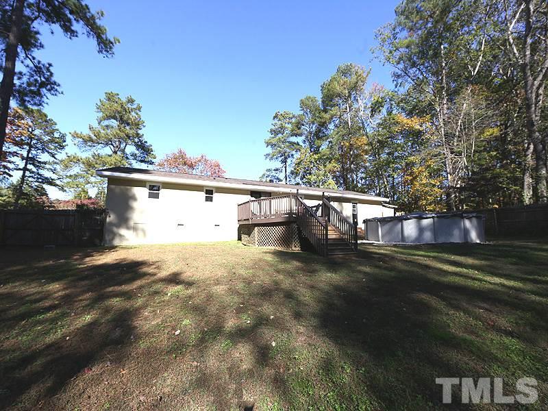 11609 Strickland Road Raleigh, NC 27613 - Photo 12 of 25 Home is on .55 Acre Lot with NEW Roof '15, NEW Septic Tank '14, NEW Water Heater '14, NEW Energy Efficient Windows '16, NEW 24' Above Ground Pool '14, and Huge Deck, 21.8 x 16.0!