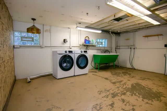 a utility room with dryer and washer