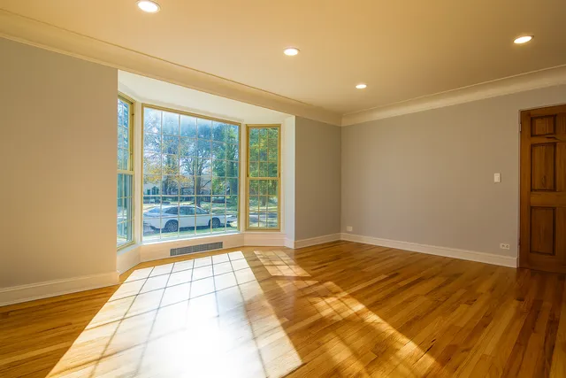 a view of an empty room and window