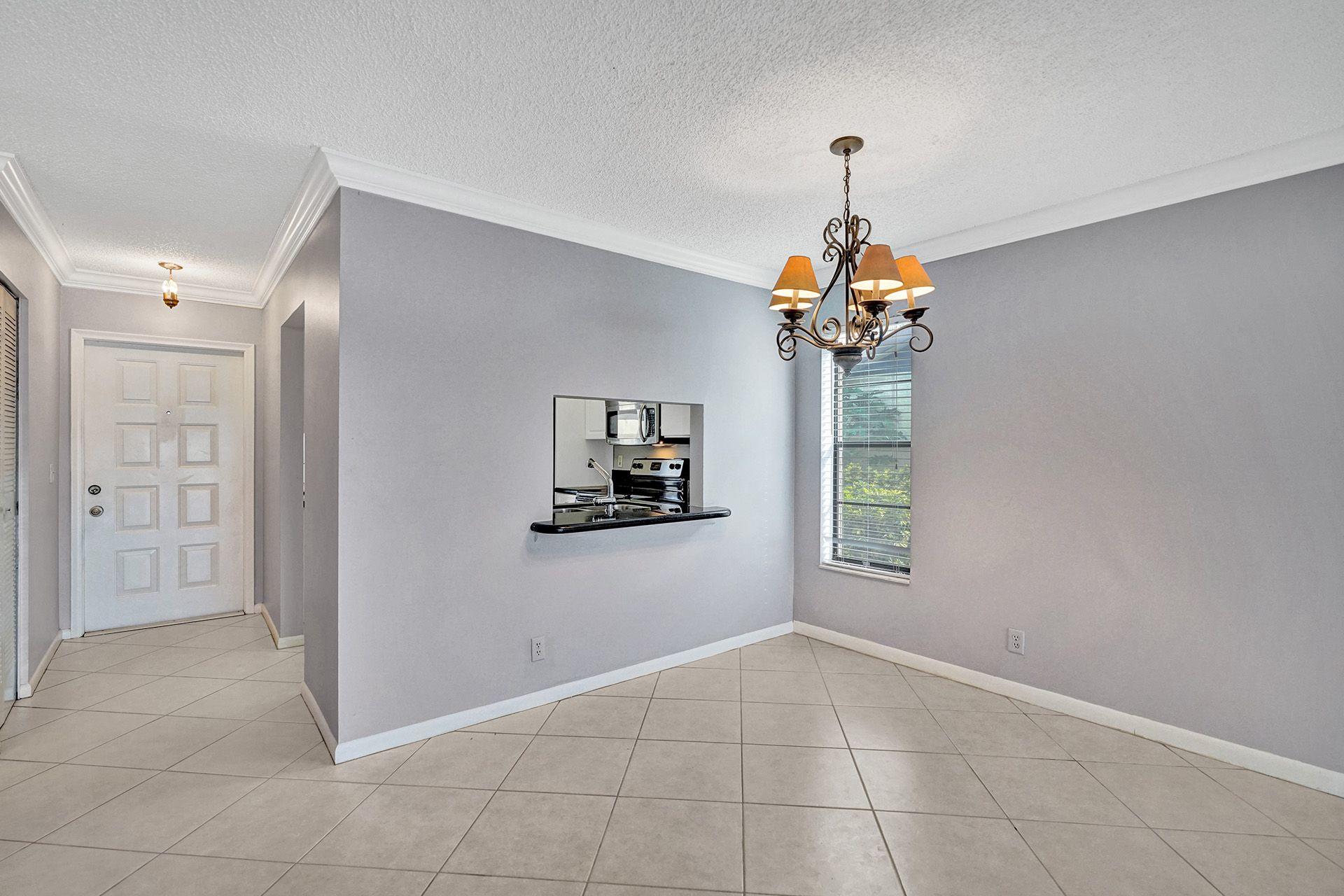 587 Banks Road Margate, FL 33063 - Photo 15 of 43 Foyer and Dining Room