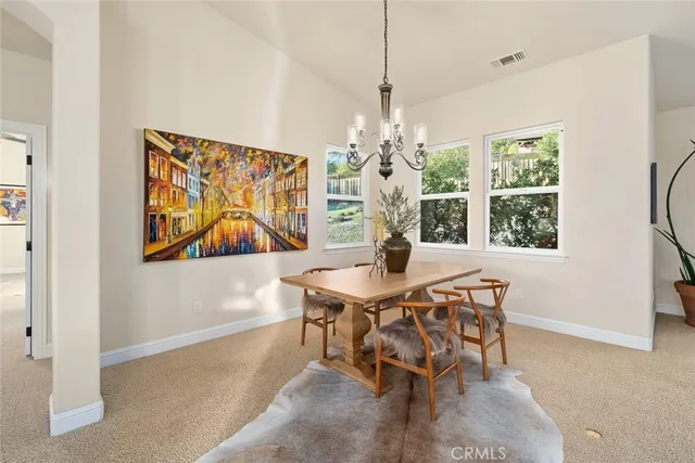 a view of living room filled with furniture