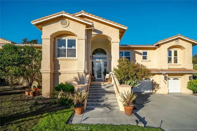 a bathroom with a sink double vanity and a mirror
