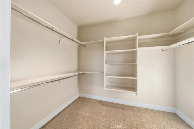 a view of an empty walk in closet