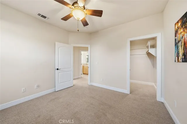 a view of a house with porch and furniture