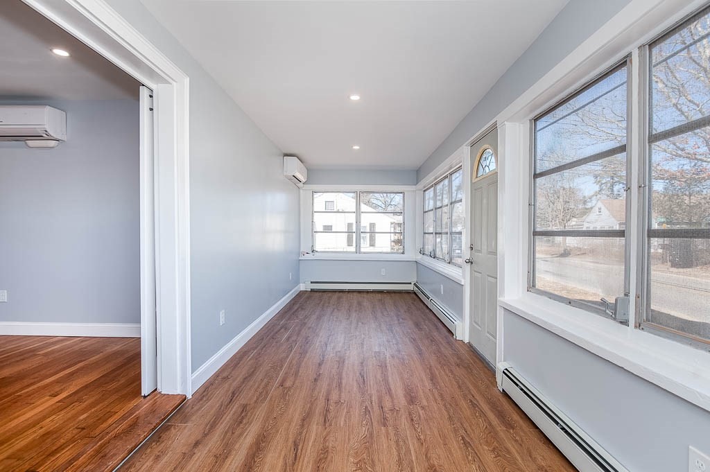 43 Shore Avenue Wareham, MA 02571 - Photo 20 of 40 a view of entryway with wooden floor and windows