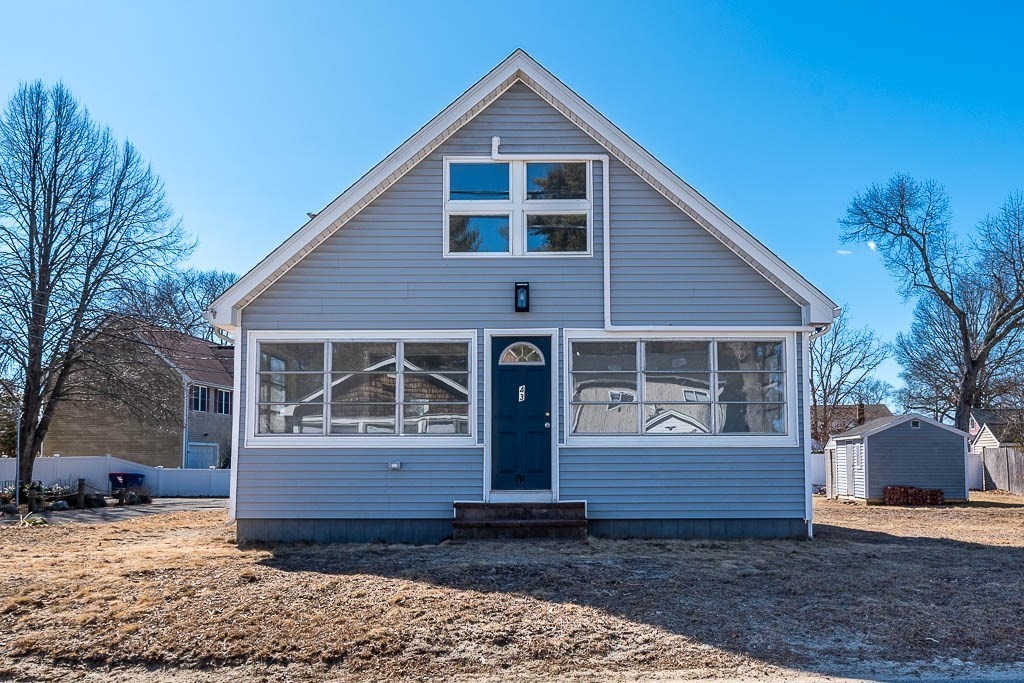 43 Shore Avenue Wareham, MA 02571 - Photo 30 of 40 a front view of a house with a yard