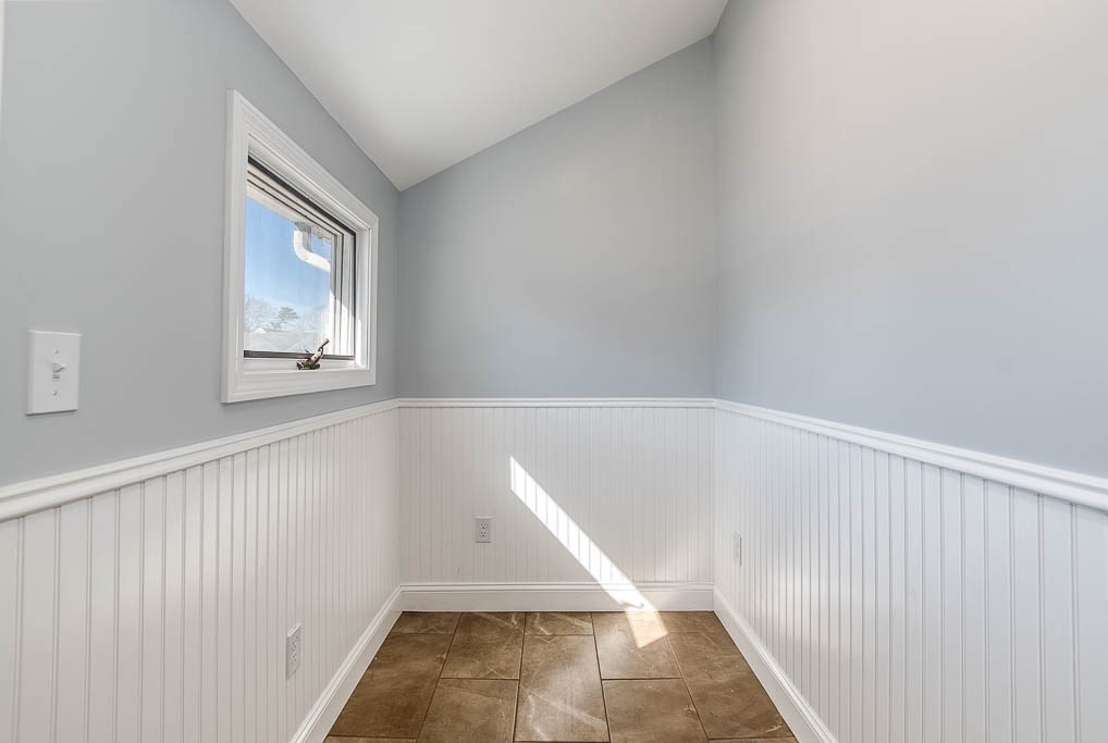 43 Shore Avenue Wareham, MA 02571 - Photo 9 of 40 a view of an empty room with windows