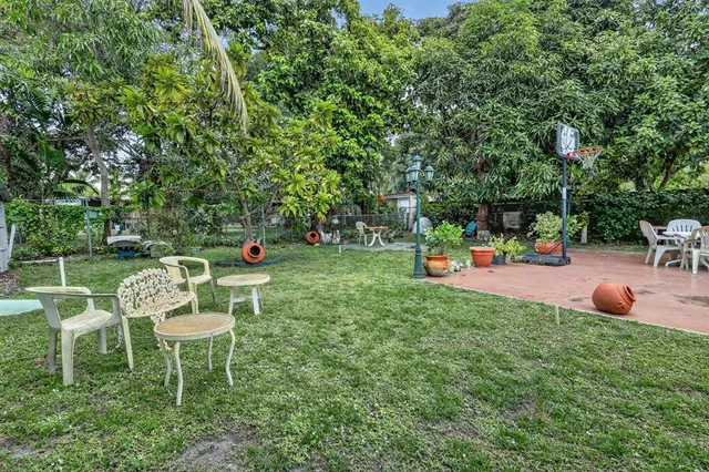 a childrens park with lots of swings and slides