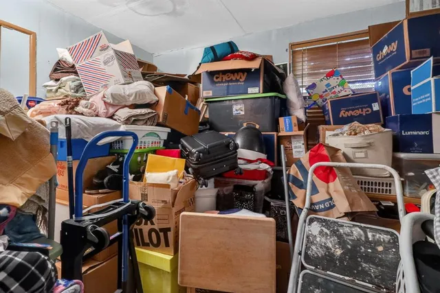 a kitchen with a sink and a refrigerator