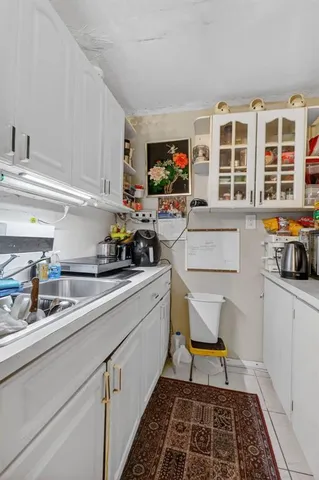 a room that has a bed and a window in it