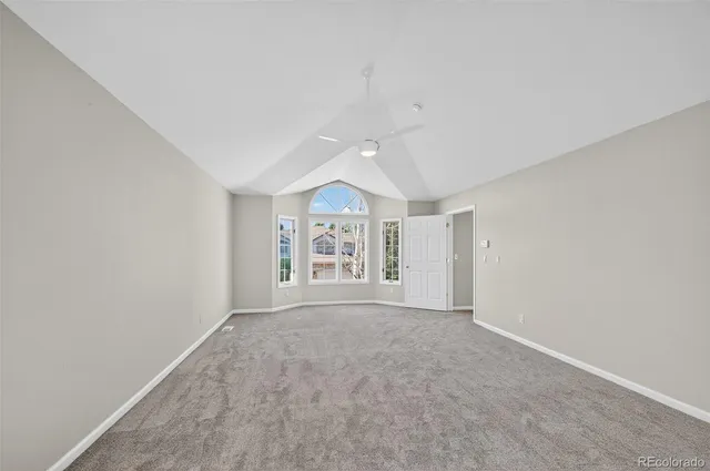 a bathroom with a double vanity sink a mirror and a bathtub