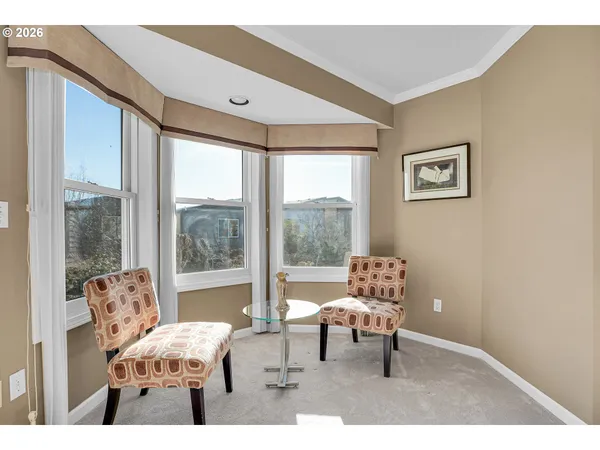 a bedroom with a bed and dresser