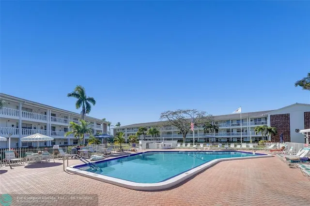a view of a swimming pool and a terrace