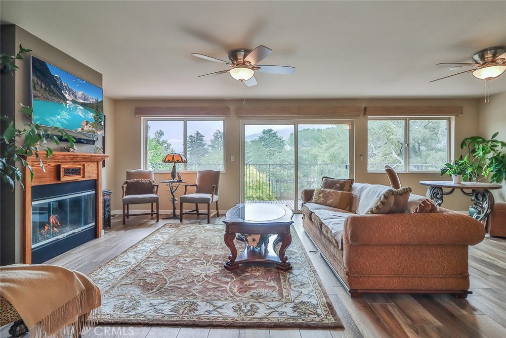 240 Portal Street Oak View, CA 93022 - Photo 23 of 75 a living room with furniture and a flat screen tv