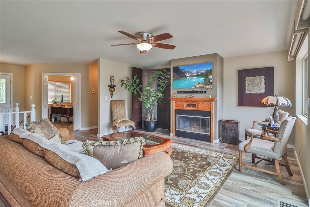 240 Portal Street Oak View, CA 93022 - Photo 26 of 75 a living room with furniture and a flat screen tv
