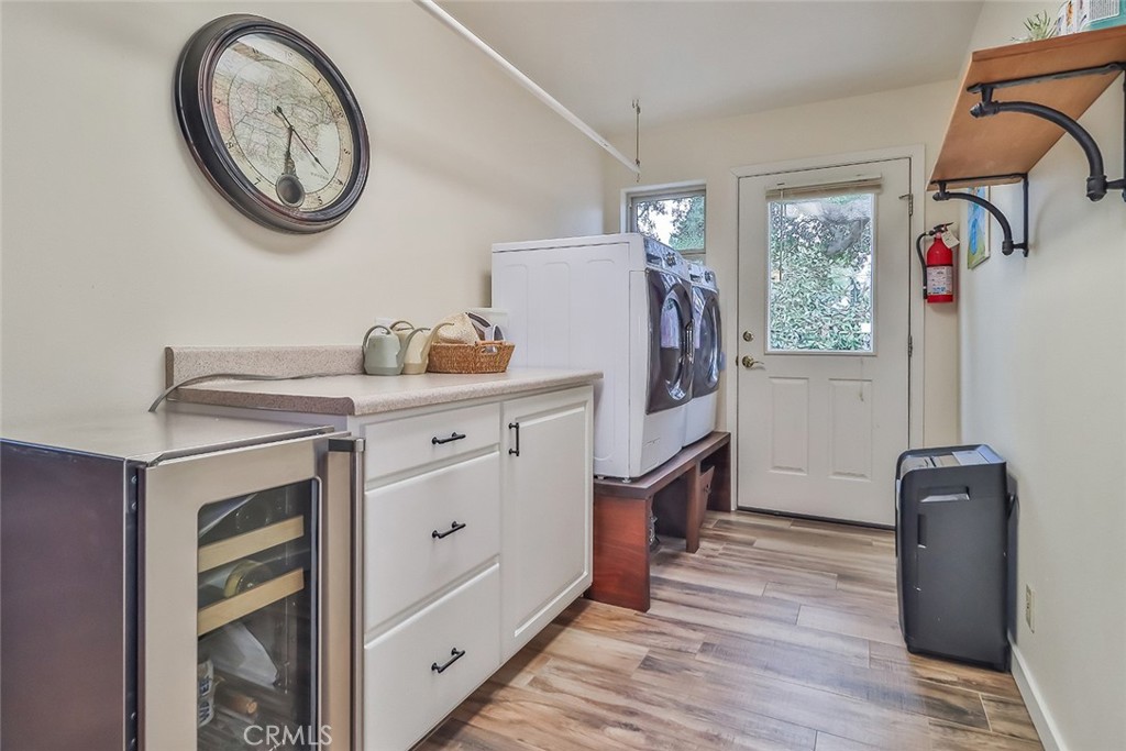 240 Portal Street Oak View, CA 93022 - Photo 38 of 75 a view of a hallway with washer and dryer