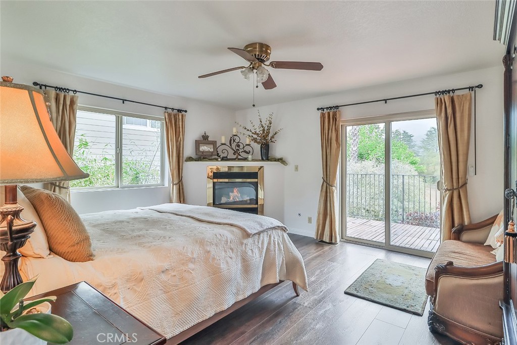 240 Portal Street Oak View, CA 93022 - Photo 42 of 75 a spacious bedroom with a bed and glass window
