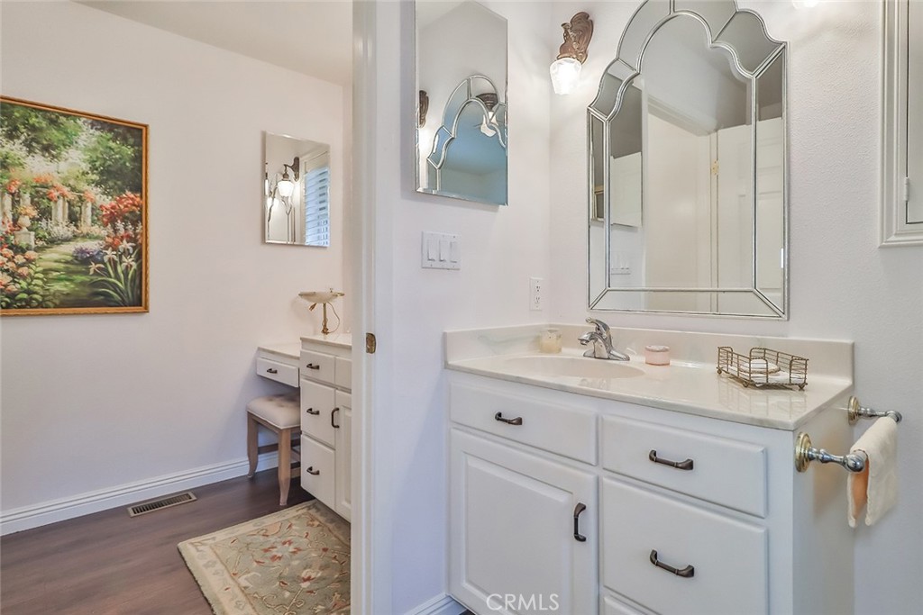 240 Portal Street Oak View, CA 93022 - Photo 48 of 75 a bathroom with a sink and a mirror
