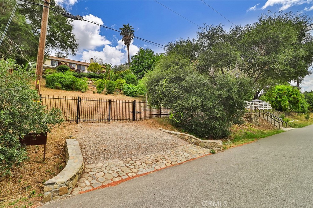 240 Portal Street Oak View, CA 93022 - Photo 75 of 75 a backyard of a house with a yard and garage