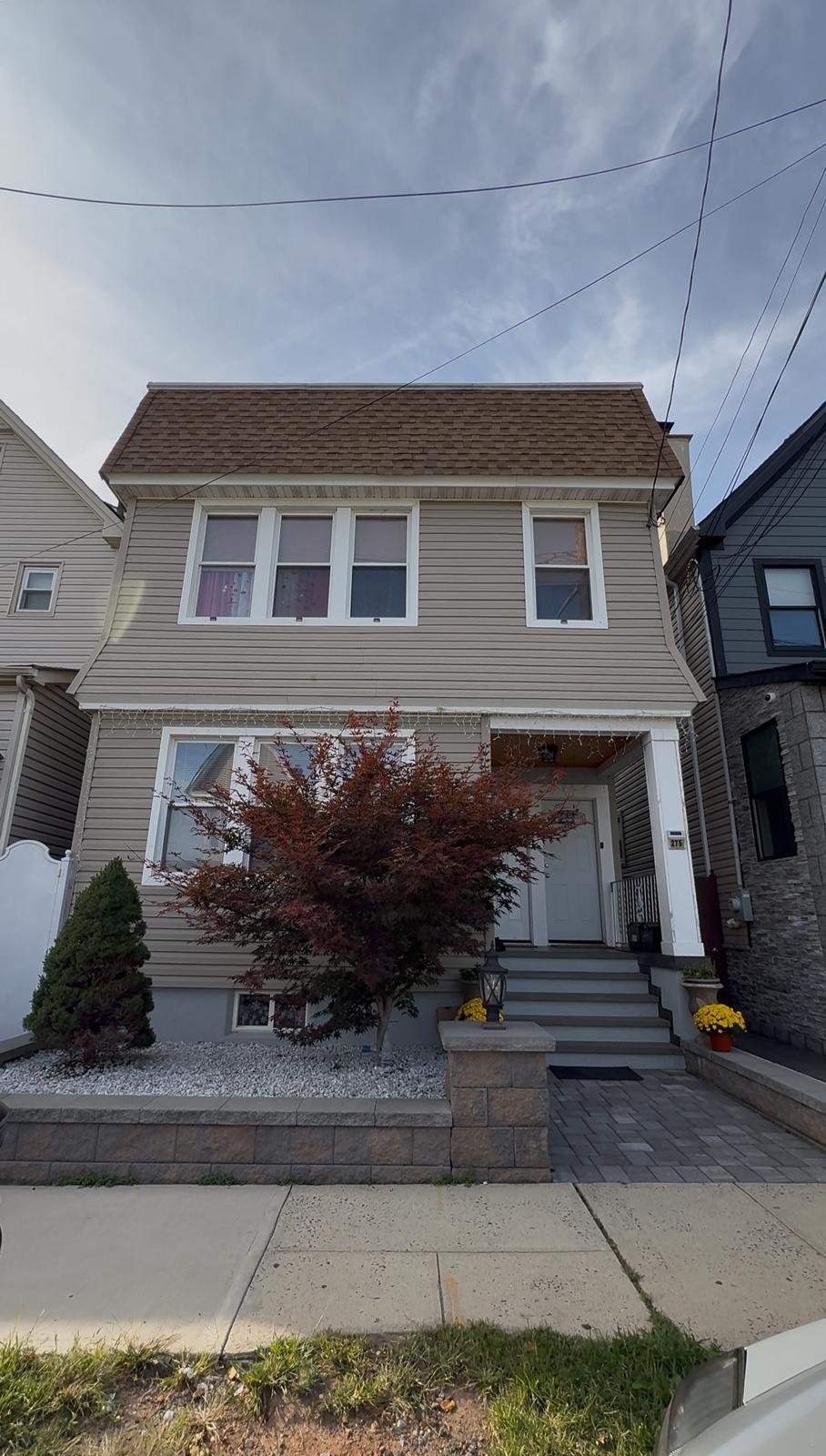 a house view with a outdoor space