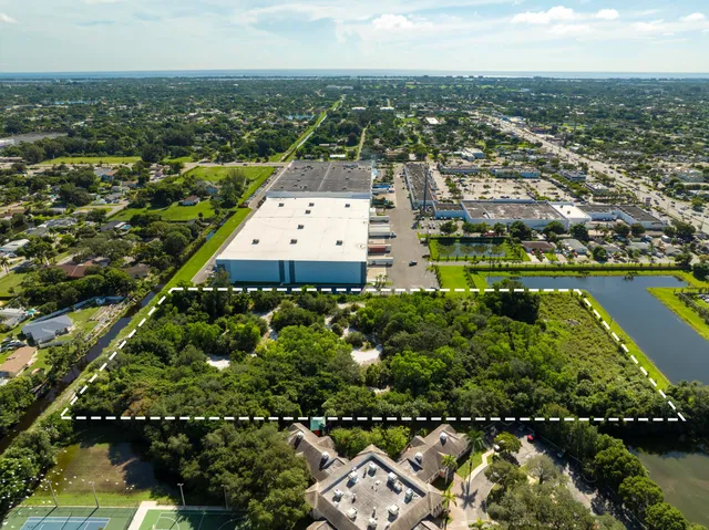 an aerial view of a house with a garden