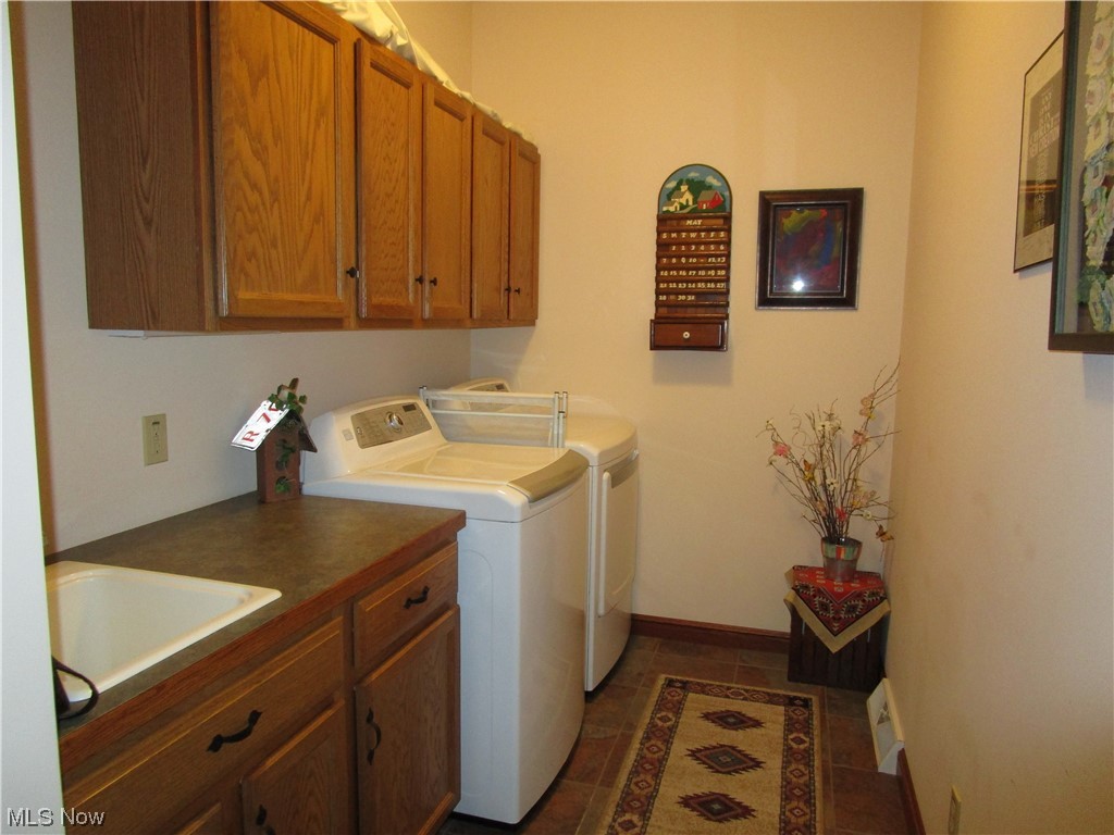 7993 Guilford Road Seville, OH 44273 - Photo 22 of 34 Laundry/mud room is when you come in from the garage.