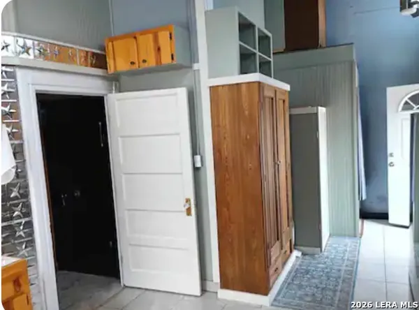 a bathroom with a sink toilet and mirror