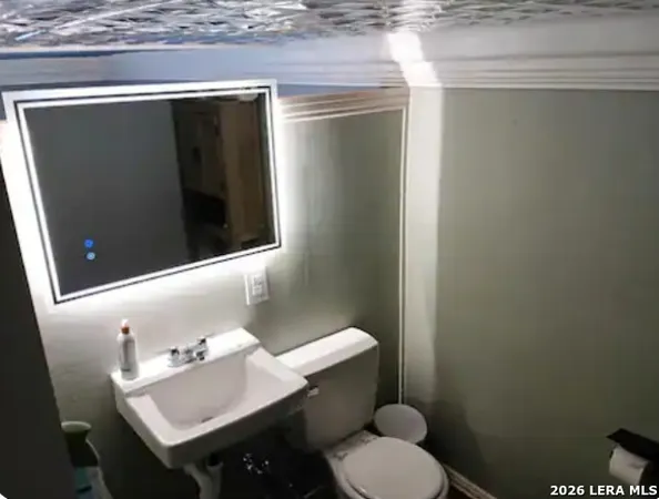 a view of a backyard with sitting area