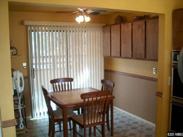 14630 Virginia Foothills Drive Reno, NV 89521 - Photo 6 of 9 a view of a dining room with furniture and window